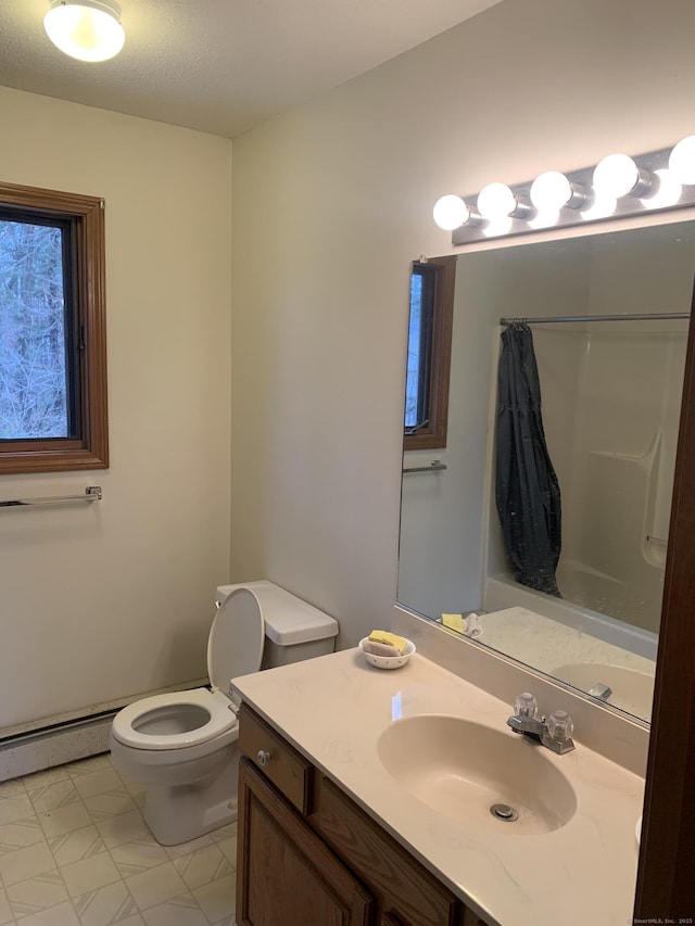58 Amanda Cir, Windsor, CT 06095 - bathroom with toilet, vanity, and baseboard heating