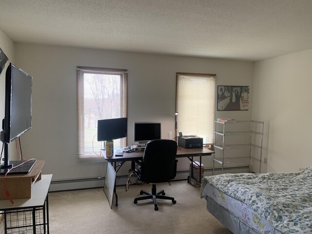 58 Amanda Cir, Windsor, CT 06095 - carpeted bedroom with baseboard heating, an office area, and a textured ceiling