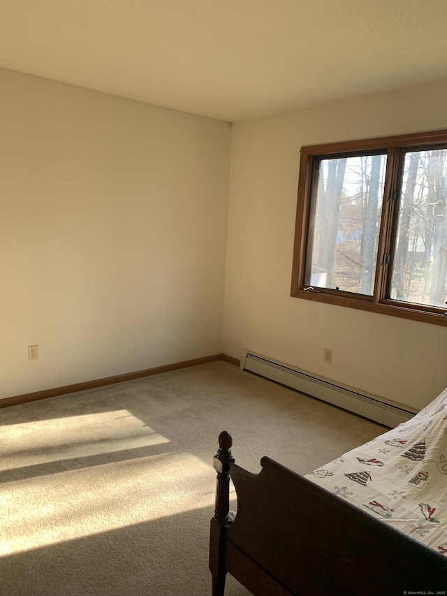 58 Amanda Cir, Windsor, CT 06095 - unfurnished bedroom featuring carpet floors, baseboard heating, and baseboards