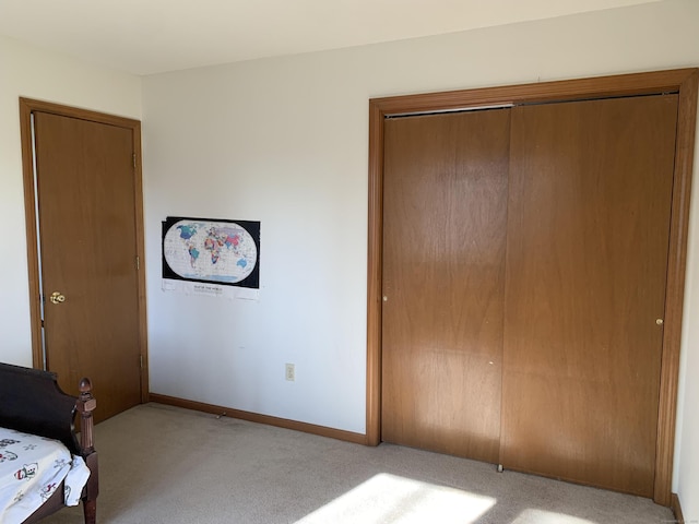 58 Amanda Cir, Windsor, CT 06095 - unfurnished bedroom with light colored carpet, a closet, and baseboards