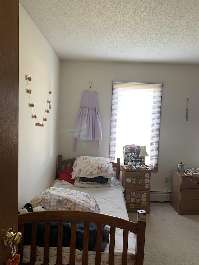 58 Amanda Cir, Windsor, CT 06095 - bedroom featuring baseboard heating, carpet, and a textured ceiling