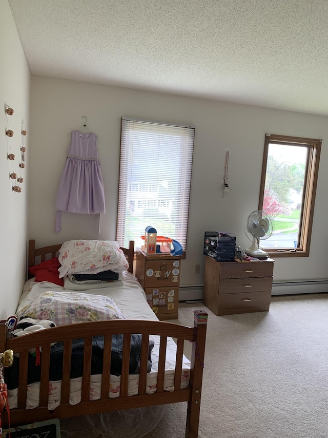 58 Amanda Cir, Windsor, CT 06095 - bedroom featuring a baseboard heating unit, carpet, and a textured ceiling