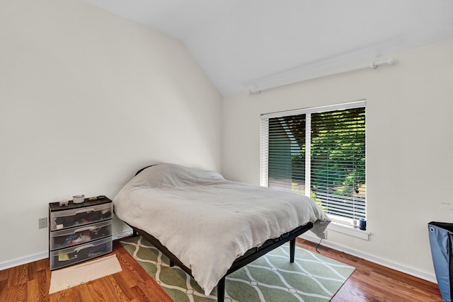 4 Pepperidge Ct Unit 4, Simsbury, CT 06070 - bedroom featuring vaulted ceiling, baseboards, and wood finished floors