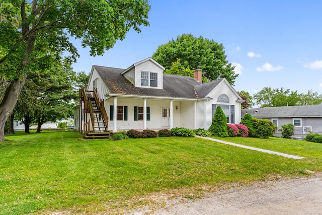 8 Wadsworth Ln, Waterford, CT 06385 - view of front of house with a front yard, stairway, a chimney, and a porch