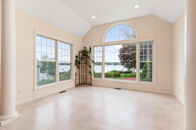8 Wadsworth Ln, Waterford, CT 06385 - unfurnished room with ornate columns, vaulted ceiling, a water view, baseboards, and tile patterned floors