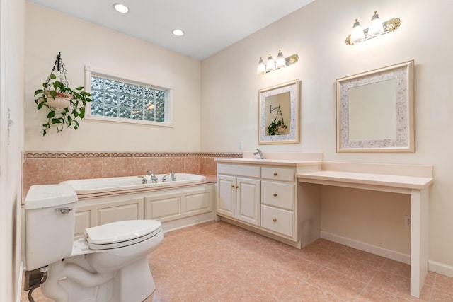 8 Wadsworth Ln, Waterford, CT 06385 - full bath featuring a garden tub, vanity, tile patterned floors, toilet, and recessed lighting