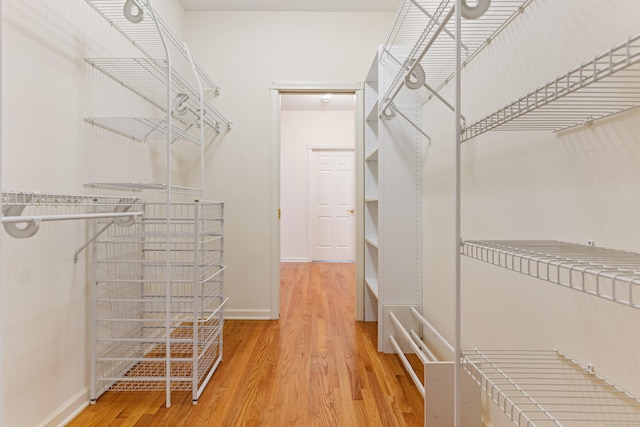 8 Wadsworth Ln, Waterford, CT 06385 - walk in closet with wood finished floors