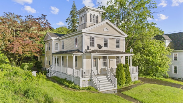 19 Elm St, Ansonia, CT 06401 - view of front facade featuring a porch, a front lawn, and stairway