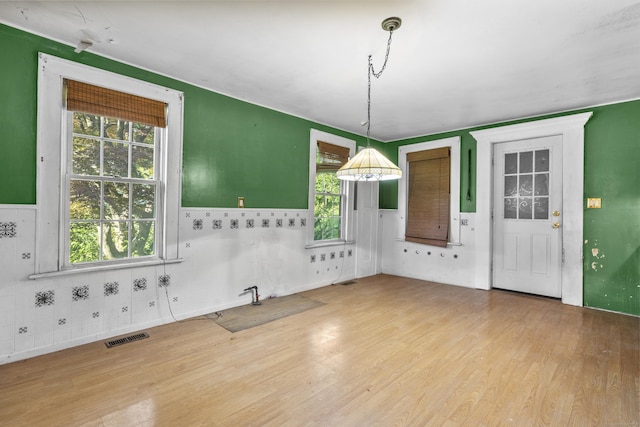 19 Elm St, Ansonia, CT 06401 - unfurnished dining area with wood finished floors
