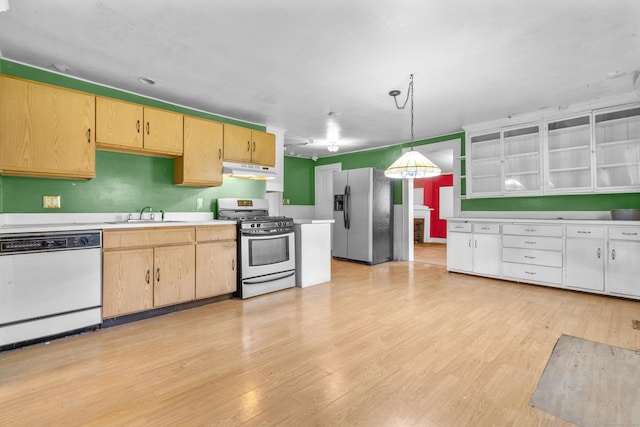 19 Elm St, Ansonia, CT 06401 - kitchen with stainless steel appliances, under cabinet range hood, light brown cabinets, and light wood-style flooring
