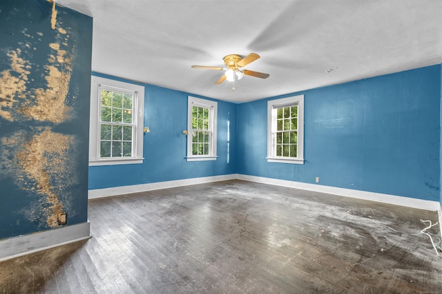 19 Elm St, Ansonia, CT 06401 - empty room with a ceiling fan, wood finished floors, healthy amount of natural light, and baseboards