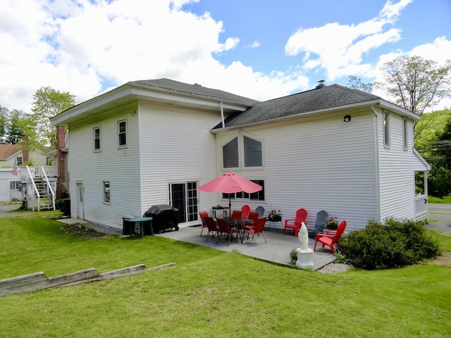 409 N Main St, Winchester, CT 06098 - rear view of property featuring a yard and a patio