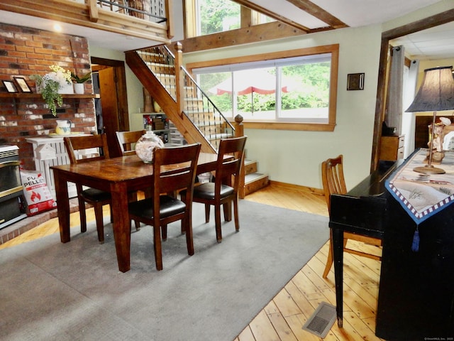 409 N Main St, Winchester, CT 06098 - dining room with wood-type flooring, plenty of natural light, and stairway