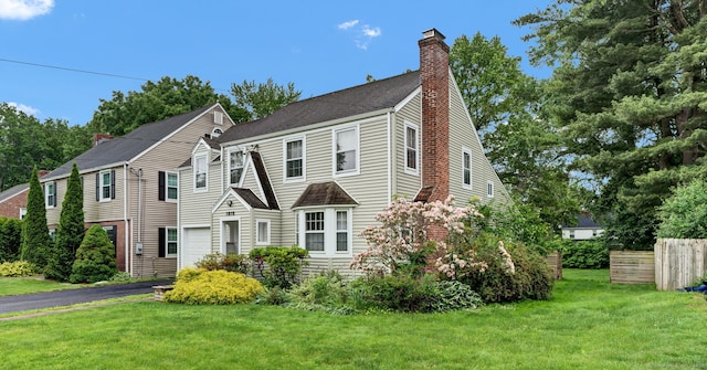 1815 Asylum Ave, West Hartford, CT 06117 - view of front facade with a chimney and roof with shingles