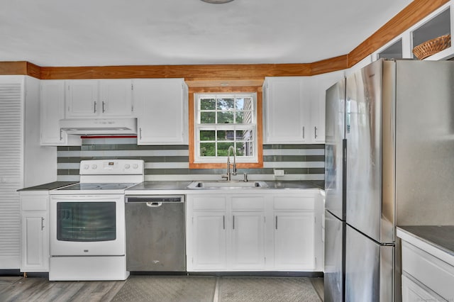 1815 Asylum Ave, West Hartford, CT 06117 - kitchen with stainless steel appliances, under cabinet range hood, white cabinetry, backsplash, and wood finished floors