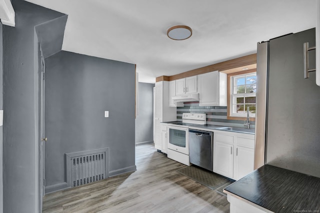 1815 Asylum Ave, West Hartford, CT 06117 - kitchen featuring stainless steel appliances, under cabinet range hood, white cabinetry, light wood-style flooring, and backsplash