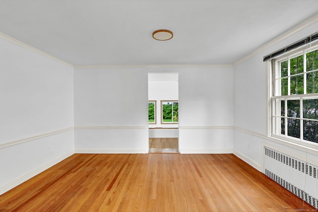 1815 Asylum Ave, West Hartford, CT 06117 - unfurnished room featuring radiator, healthy amount of natural light, wood finished floors, and crown molding