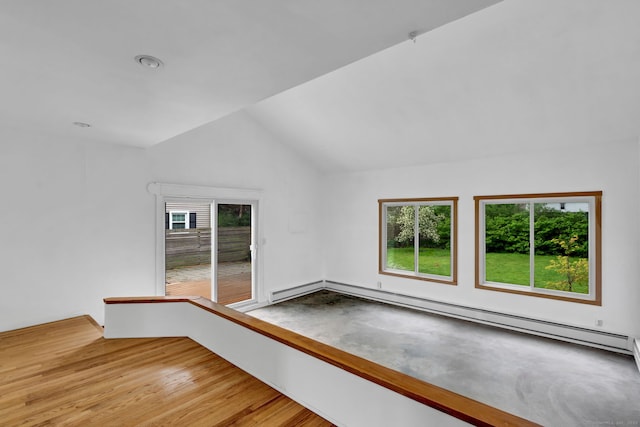 1815 Asylum Ave, West Hartford, CT 06117 - spare room with vaulted ceiling, plenty of natural light, a baseboard heating unit, and light wood-type flooring