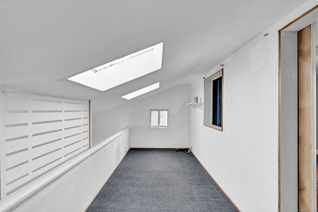 1815 Asylum Ave, West Hartford, CT 06117 - additional living space with vaulted ceiling, a skylight, and carpet floors
