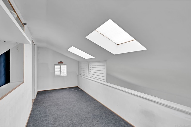 1815 Asylum Ave, West Hartford, CT 06117 - additional living space with a skylight, lofted ceiling, and carpet