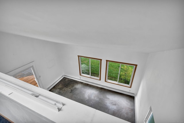 1815 Asylum Ave, West Hartford, CT 06117 - unfurnished living room featuring concrete floors and baseboard heating