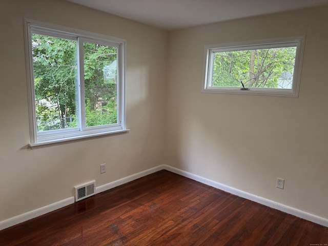 256 Alexander Rd, New Britain, CT 06053 - empty room featuring baseboards and dark wood finished floors