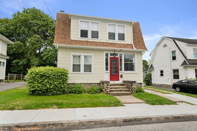 58 Gorton St, New London, CT 06320 - dutch colonial featuring entry steps, a shingled roof, and a front yard