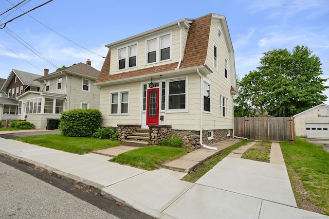 58 Gorton St, New London, CT 06320 - colonial inspired home with a shingled roof and a gambrel roof