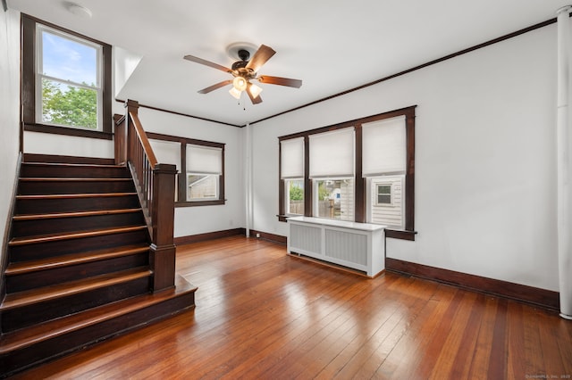 58 Gorton St, New London, CT 06320 - unfurnished living room featuring baseboards, healthy amount of natural light, and stairway