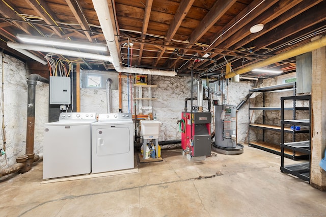 58 Gorton St, New London, CT 06320 - basement featuring washing machine and clothes dryer, electric panel, water heater, a heating unit, and a sink