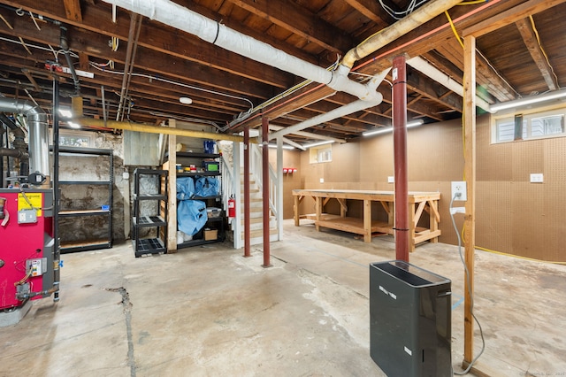 58 Gorton St, New London, CT 06320 - basement with a heating unit and a workshop area