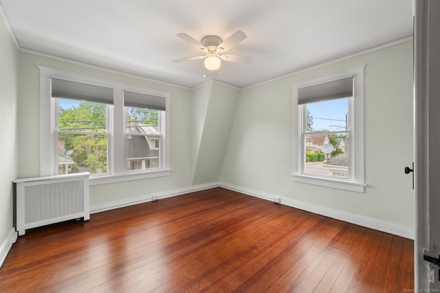 58 Gorton St, New London, CT 06320 - empty room with radiator heating unit, wood-type flooring, baseboards, ornamental molding, and ceiling fan