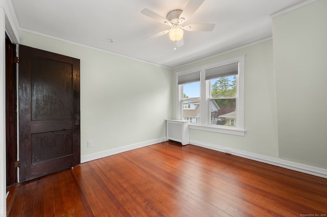 58 Gorton St, New London, CT 06320 - spare room featuring a ceiling fan, hardwood / wood-style flooring, ornamental molding, and baseboards