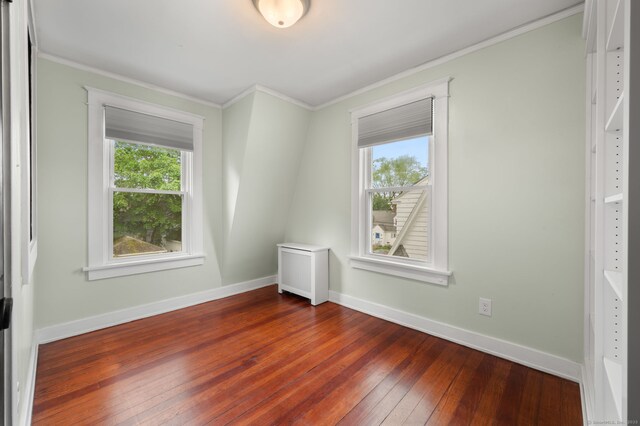 58 Gorton St, New London, CT 06320 - spare room with ornamental molding, hardwood / wood-style floors, and baseboards