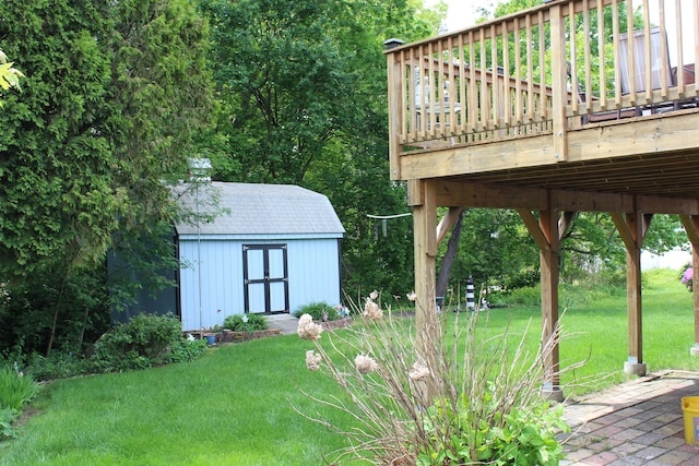 243 Courtland Ave, Waterbury, CT 06705 - view of grassy yard with a wooden deck