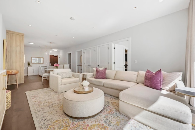 180 Park St Unit D103, New Canaan, CT 06840 - living area with dark wood-style flooring and recessed lighting