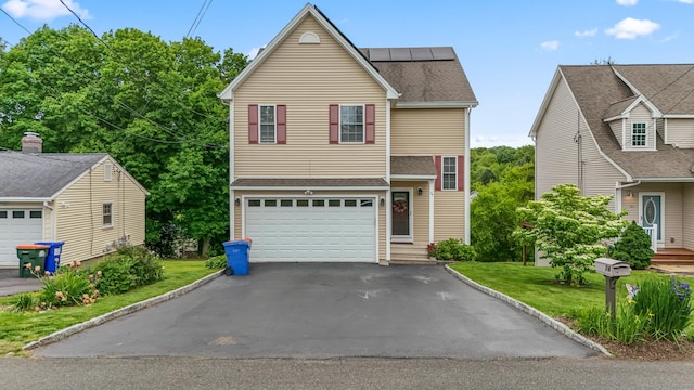 74 Avery Ave, Meriden, CT 06450 - traditional-style home with driveway and an attached garage