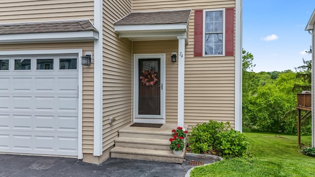 74 Avery Ave, Meriden, CT 06450 - entrance to property featuring an attached garage and a lawn