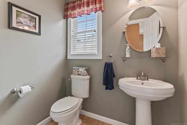 74 Avery Ave, Meriden, CT 06450 - half bath featuring toilet, baseboards, and tile patterned floors