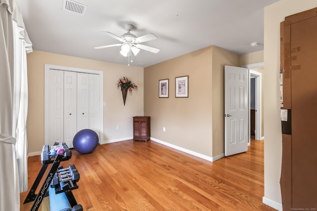 74 Avery Ave, Meriden, CT 06450 - workout area featuring light wood finished floors, ceiling fan, and baseboards