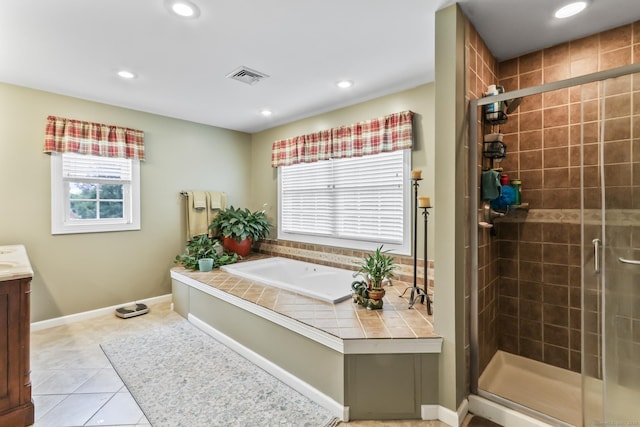 74 Avery Ave, Meriden, CT 06450 - bathroom featuring vanity, a bath, a stall shower, recessed lighting, and tile patterned floors