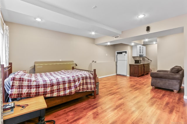 74 Avery Ave, Meriden, CT 06450 - bedroom featuring freestanding refrigerator, light wood finished floors, baseboards, and recessed lighting
