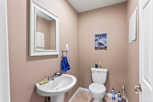 74 Avery Ave, Meriden, CT 06450 - half bathroom with toilet, tile patterned flooring, baseboards, and a sink