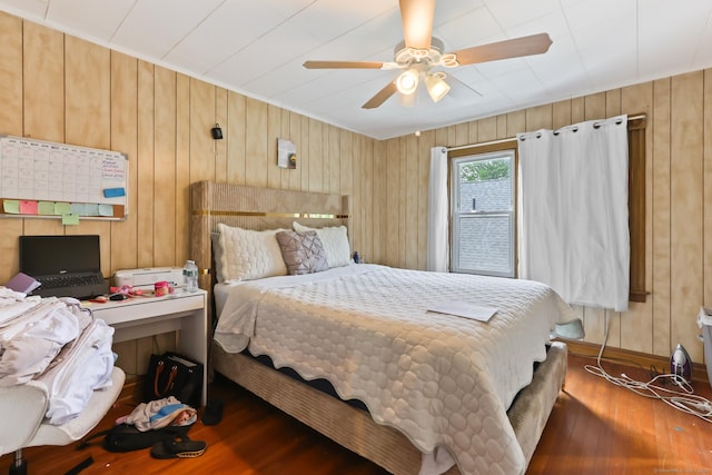 30 Newton St, Hartford, CT 06106 - bedroom featuring hardwood / wood-style floors, wood walls, and a ceiling fan