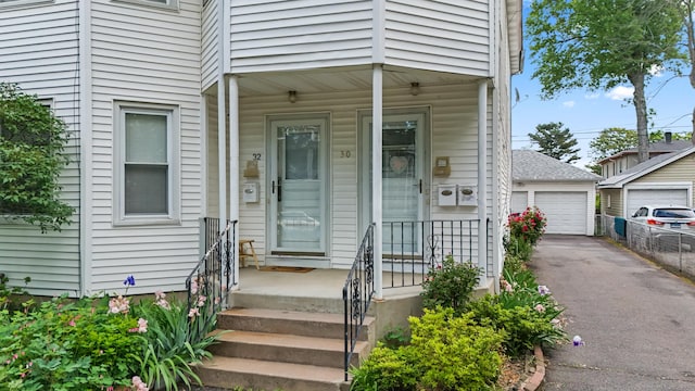30 Newton St, Hartford, CT 06106 - doorway to property with a detached garage