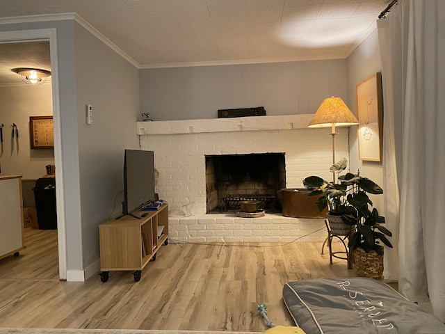 2 Dilliston Rd, Barkhamsted, CT 06063 - living area featuring wood finished floors, ornamental molding, and a brick fireplace