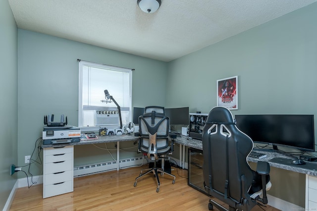 104 E St, Hebron, CT 06248 - home office with wood finished floors, baseboard heating, a textured ceiling, baseboards, and cooling unit