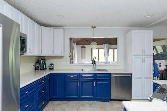 104 E St, Hebron, CT 06248 - kitchen featuring appliances with stainless steel finishes, a sink, wood ceiling, white cabinets, and blue cabinetry
