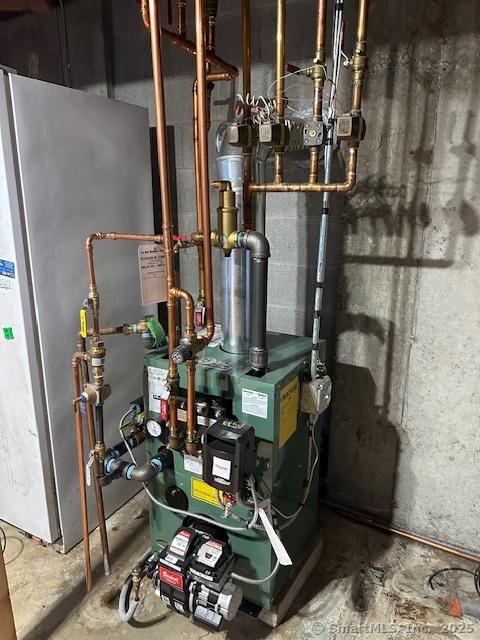 149 Mill Hill Rd, Colchester, CT 06415 - utilities with water heater and a heating unit