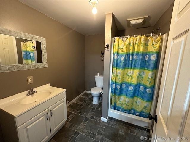 149 Mill Hill Rd, Colchester, CT 06415 - full bathroom with vanity, toilet, curtained shower, and baseboards